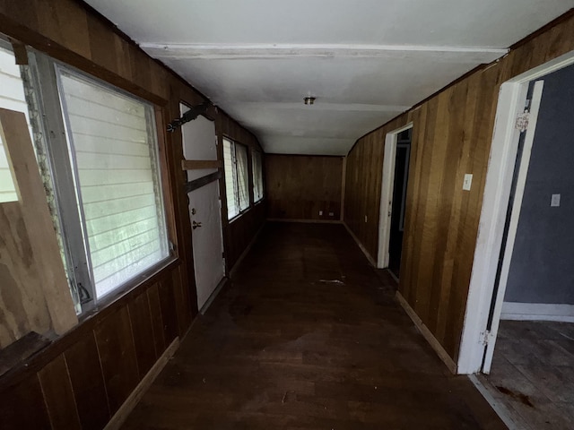 2726 13th St, Port Arthur, TX 77640 - corridor with wooden walls and dark wood-style floors