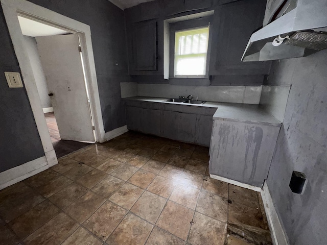 2726 13th St, Port Arthur, TX 77640 - kitchen with extractor fan and light countertops