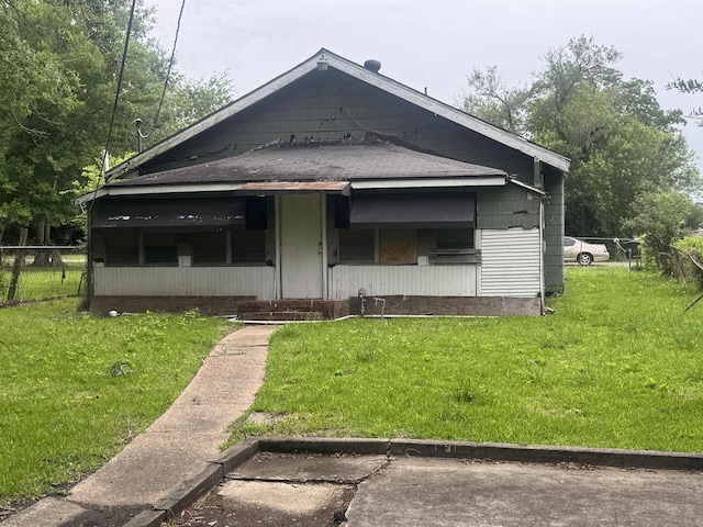 2726 13th St, Port Arthur, TX 77640 - view of front facade featuring covered porch and a shingled roof