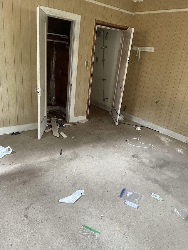 5129 5th St, Port Arthur, TX 77642 - unfurnished bedroom featuring wooden walls and baseboards