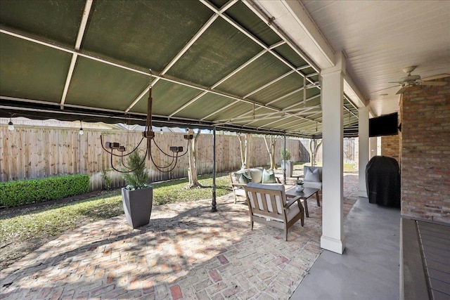 2175 Brewton Cir, Beaumont, TX 77706 - view of patio with ceiling fan, an outdoor hangout area, and a fenced backyard