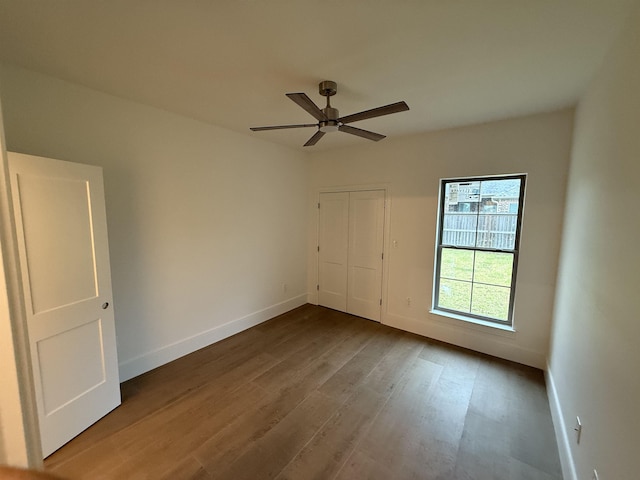 3547 Lily Ln, Beaumont, TX 77713 - unfurnished room featuring wood finished floors, baseboards, and a ceiling fan