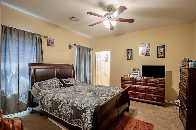 carpeted bedroom featuring a ceiling fan