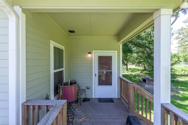 wooden deck featuring covered porch