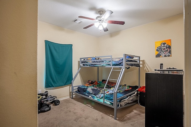 bedroom with carpet flooring and a ceiling fan