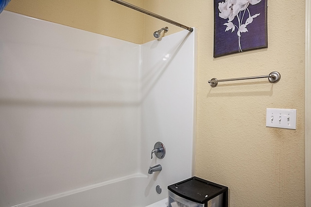 full bathroom with bathing tub / shower combination