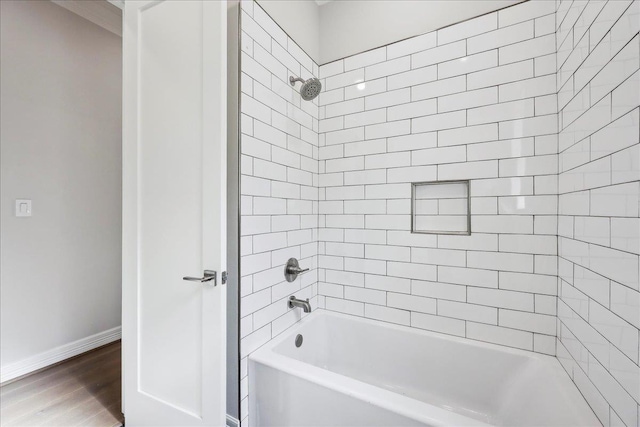 6588 Pointe Park, Beaumont, TX 77706 - full bath featuring baseboards, bathing tub / shower combination, and wood finished floors
