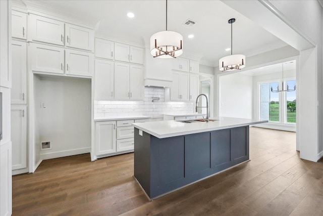 6588 Pointe Park, Beaumont, TX 77706 - kitchen featuring a chandelier, a sink, white cabinetry, tasteful backsplash, and recessed lighting