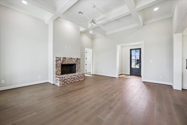 6588 Pointe Park, Beaumont, TX 77706 - unfurnished living room with a ceiling fan, beamed ceiling, baseboards, coffered ceiling, and a fireplace