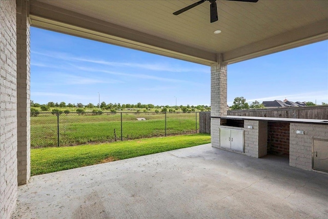6588 Pointe Park, Beaumont, TX 77706 - view of patio / terrace featuring an outdoor kitchen and ceiling fan