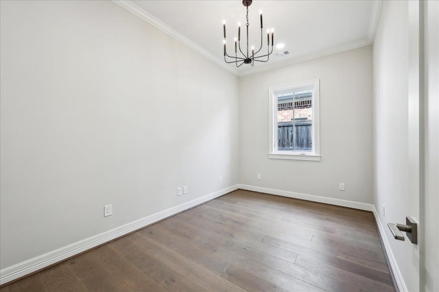 6588 Pointe Park, Beaumont, TX 77706 - empty room featuring a chandelier, crown molding, baseboards, and dark wood-type flooring