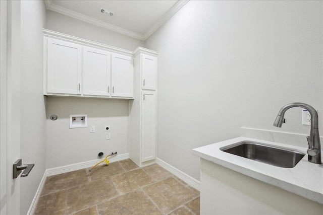 6588 Pointe Park, Beaumont, TX 77706 - laundry area featuring gas dryer hookup, cabinet space, hookup for a washing machine, crown molding, and hookup for an electric dryer