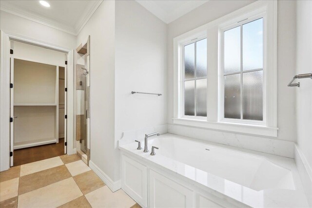 6588 Pointe Park, Beaumont, TX 77706 - bathroom featuring a stall shower, a bath, crown molding, and baseboards