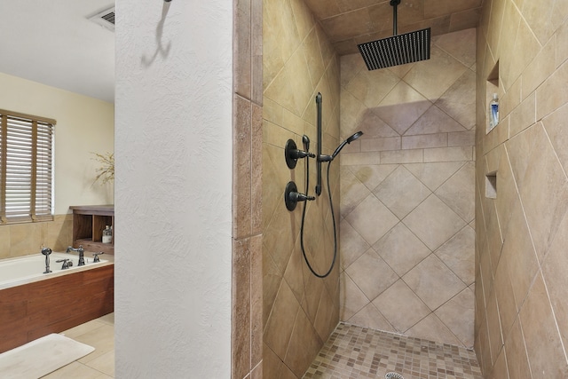 bathroom with tile patterned flooring and plus walk in shower