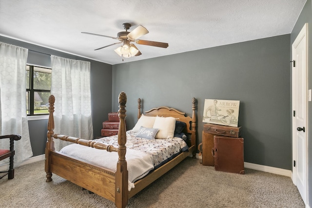 bedroom with ceiling fan and carpet floors