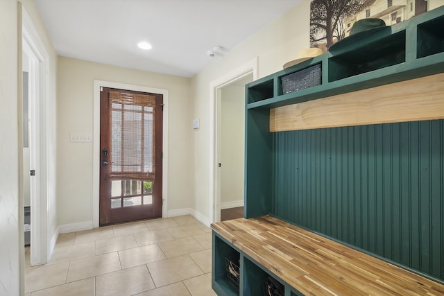 mudroom featuring light tile patterned floors