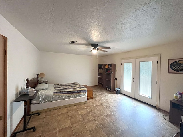 155 Hunters Ct, Lumberton, TX 77657 - bedroom featuring access to exterior, french doors, a textured ceiling, and a ceiling fan