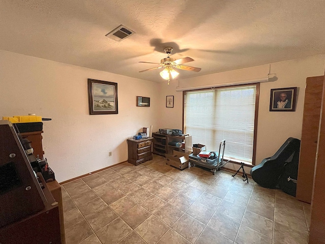 155 Hunters Ct, Lumberton, TX 77657 - office space with ceiling fan, a textured ceiling, and baseboards