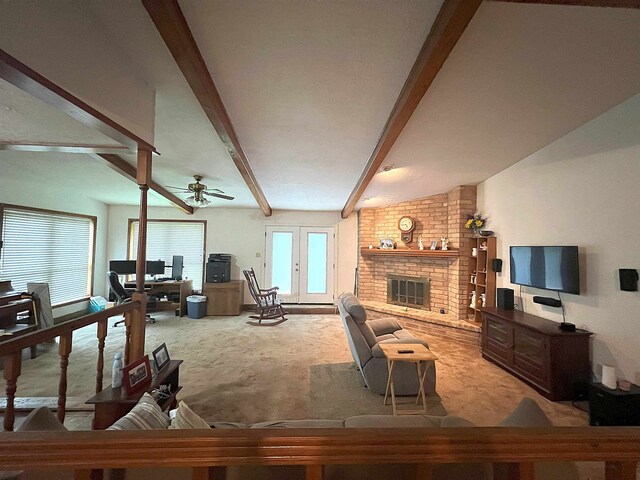 155 Hunters Ct, Lumberton, TX 77657 - carpeted living area featuring an office area, beam ceiling, ceiling fan, and a brick fireplace