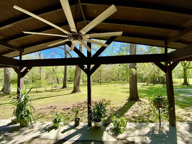 3900 Lakeview Cutoff, Vidor, TX 77662 - view of grassy yard with ceiling fan and view of scattered trees
