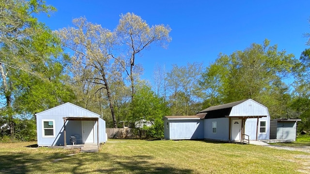 exterior space featuring an outdoor structure and a shed