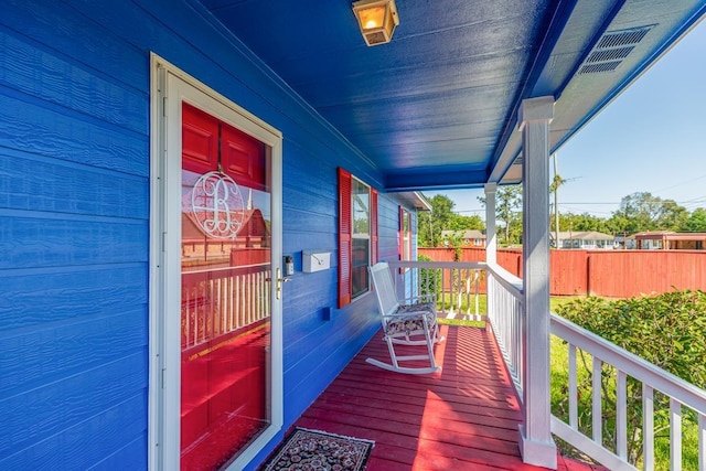 wooden deck featuring a porch