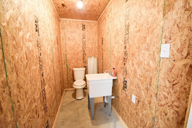 bathroom featuring toilet