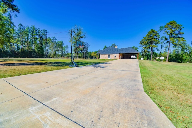 ranch-style home with a front yard and a garage