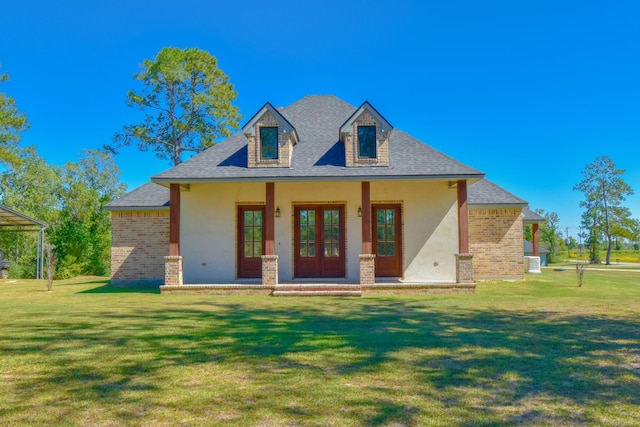 view of front facade with a porch and a front lawn