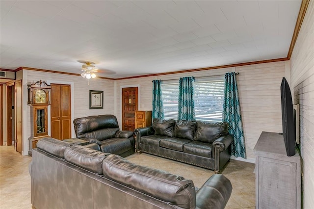 living room featuring ceiling fan and ornamental molding