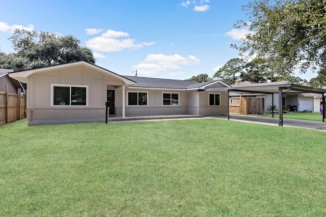 single story home with a front yard and a carport