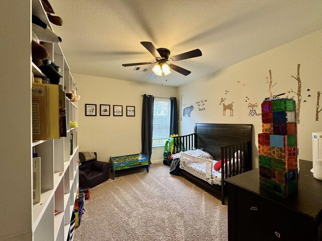 22043 Rocky Reserve Dr, Northwest Harris, TX 77447 - bedroom featuring visible vents, ceiling fan, carpet flooring, and a textured ceiling