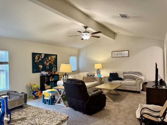 22043 Rocky Reserve Dr, Northwest Harris, TX 77447 - carpeted living area with lofted ceiling with beams, a wealth of natural light, visible vents, and a ceiling fan