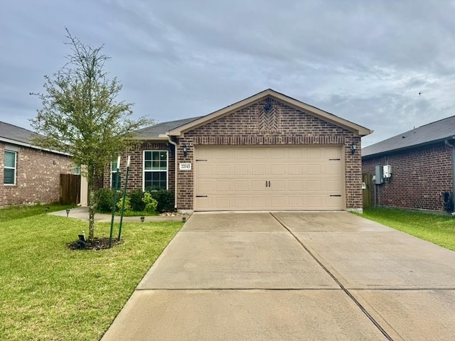 22043 Rocky Reserve Dr, Northwest Harris, TX 77447 - ranch-style house with a front lawn, an attached garage, brick siding, and concrete driveway