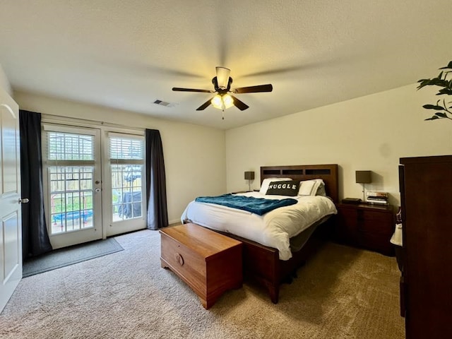 22043 Rocky Reserve Dr, Northwest Harris, TX 77447 - bedroom with french doors, access to outside, visible vents, ceiling fan, and carpet