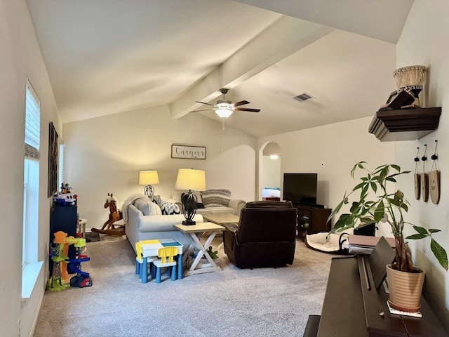 22043 Rocky Reserve Dr, Northwest Harris, TX 77447 - living room with carpet flooring, a ceiling fan, lofted ceiling with beams, visible vents, and arched walkways