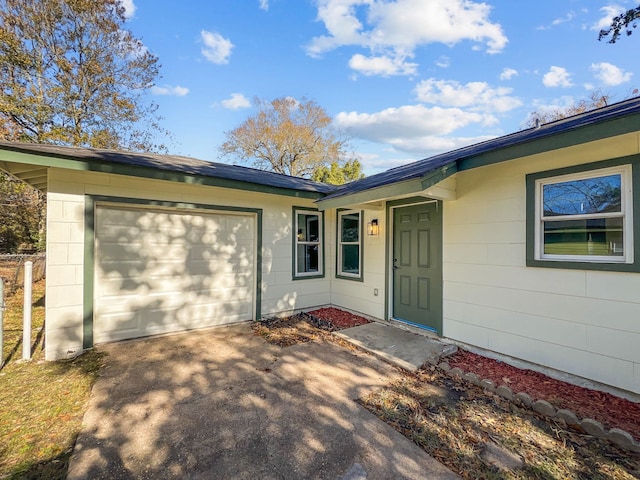 property entrance featuring a garage