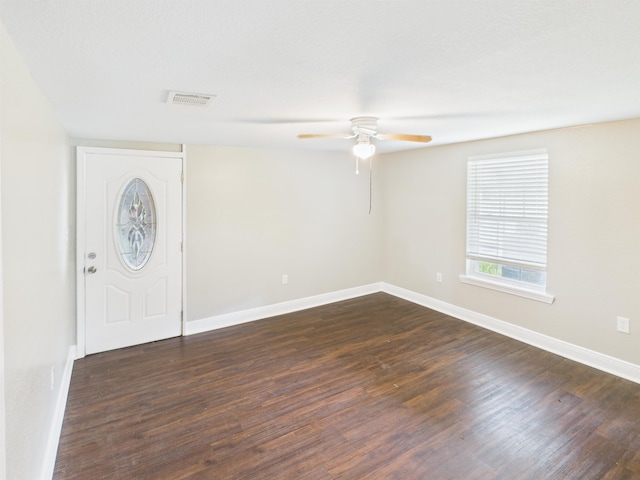 1325 S Main St, Vidor, TX 77662 - entryway featuring ceiling fan, baseboards, dark wood-style floors, and visible vents