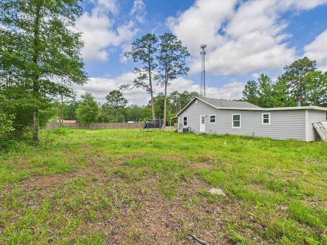 1325 S Main St, Vidor, TX 77662 - view of yard with fence and a trampoline