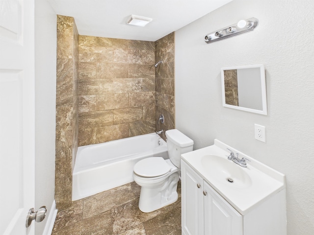 1325 S Main St, Vidor, TX 77662 - full bath featuring stone finish floor, toilet, vanity, and shower / tub combination