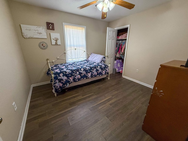220 Dupuis St, Bridge City, TX 77611 - bedroom with baseboards, dark wood-style floors, ceiling fan, and a closet