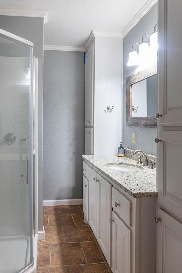 334 Pinehurst Dr, Sour Lake, TX 77659 - full bath with a shower stall, crown molding, stone finish floors, vanity, and baseboards