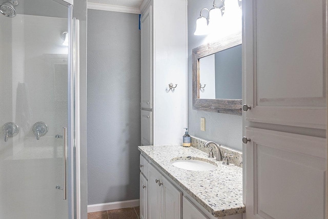 334 Pinehurst Dr, Sour Lake, TX 77659 - bathroom with a stall shower, crown molding, vanity, and tile patterned floors