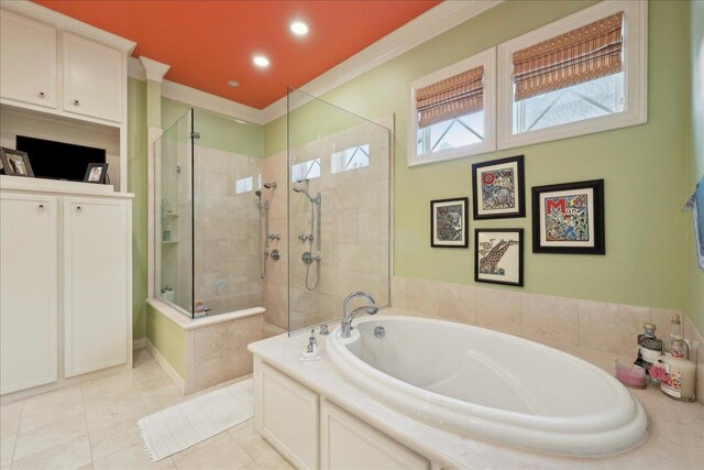 5160 Littlechase Dr, Beaumont, TX 77706 - full bathroom featuring crown molding, a tile shower, a garden tub, and tile patterned floors