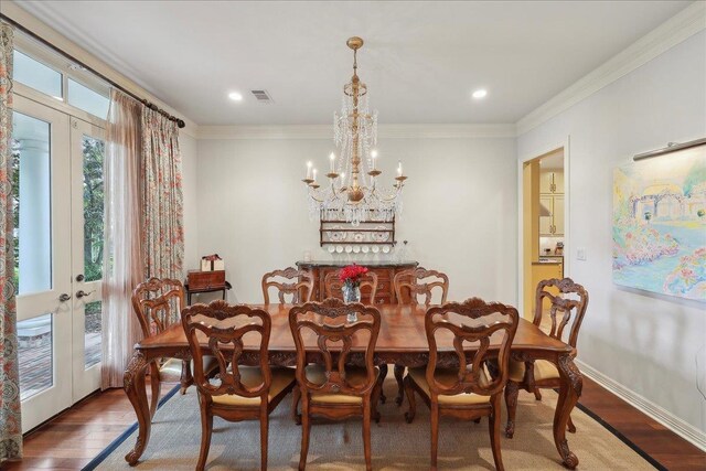 5160 Littlechase Dr, Beaumont, TX 77706 - dining space featuring french doors, wood finished floors, a chandelier, ornamental molding, and recessed lighting