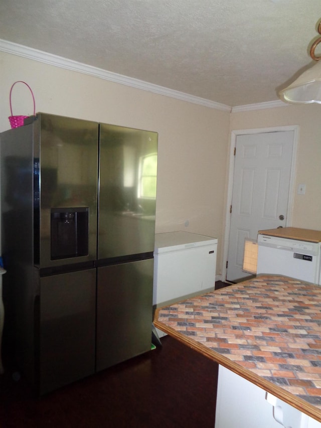 2308 Travis St, Orange, TX 77630 - kitchen featuring butcher block countertops, refrigerator, crown molding, white cabinetry, and stainless steel fridge with ice dispenser