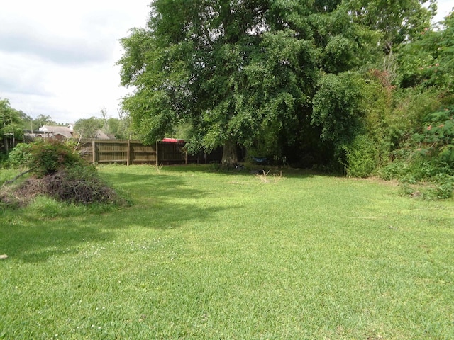 2308 Travis St, Orange, TX 77630 - view of yard with fence