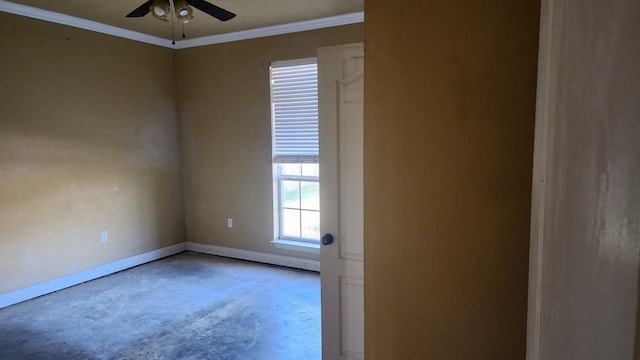 spare room with crown molding, ceiling fan, plenty of natural light, and concrete floors