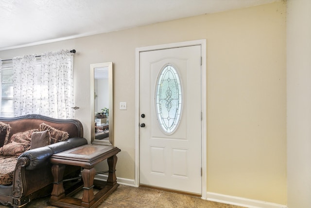 entrance foyer featuring plenty of natural light