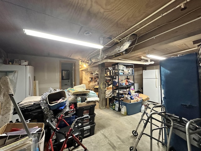 466 Galahad Loop Rd, Woodville, TX 75979 - basement featuring freestanding refrigerator